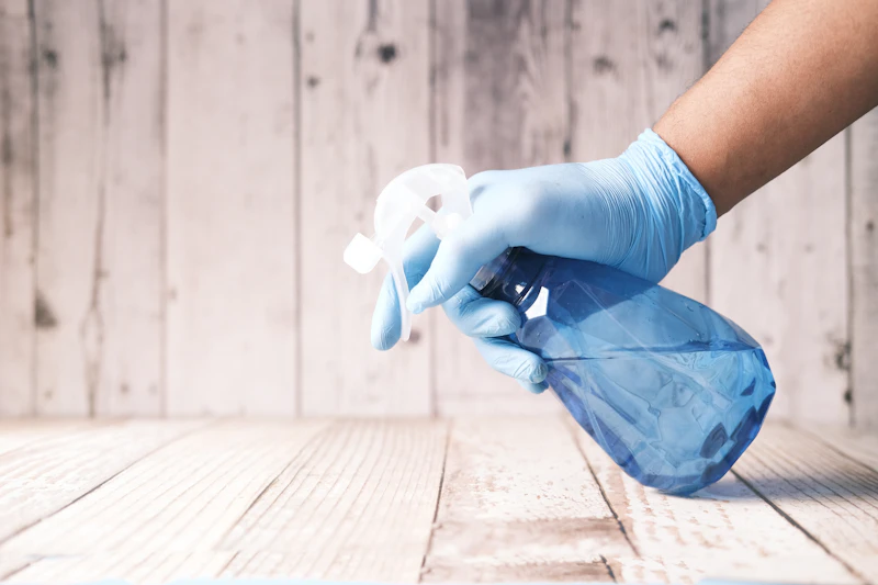 Professional cleaning team reviewing schedule on tablet