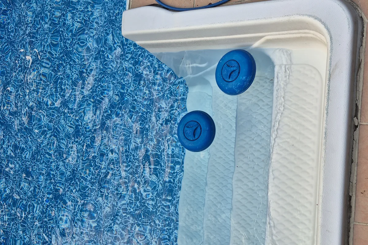 Chemical dispensers maintaining water balance on the pool steps