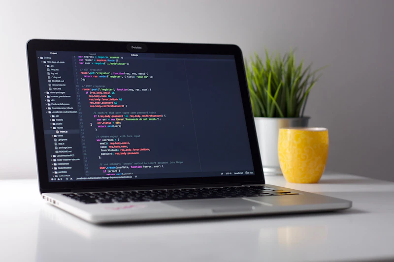 Laptop displaying a code editor during a freelance project