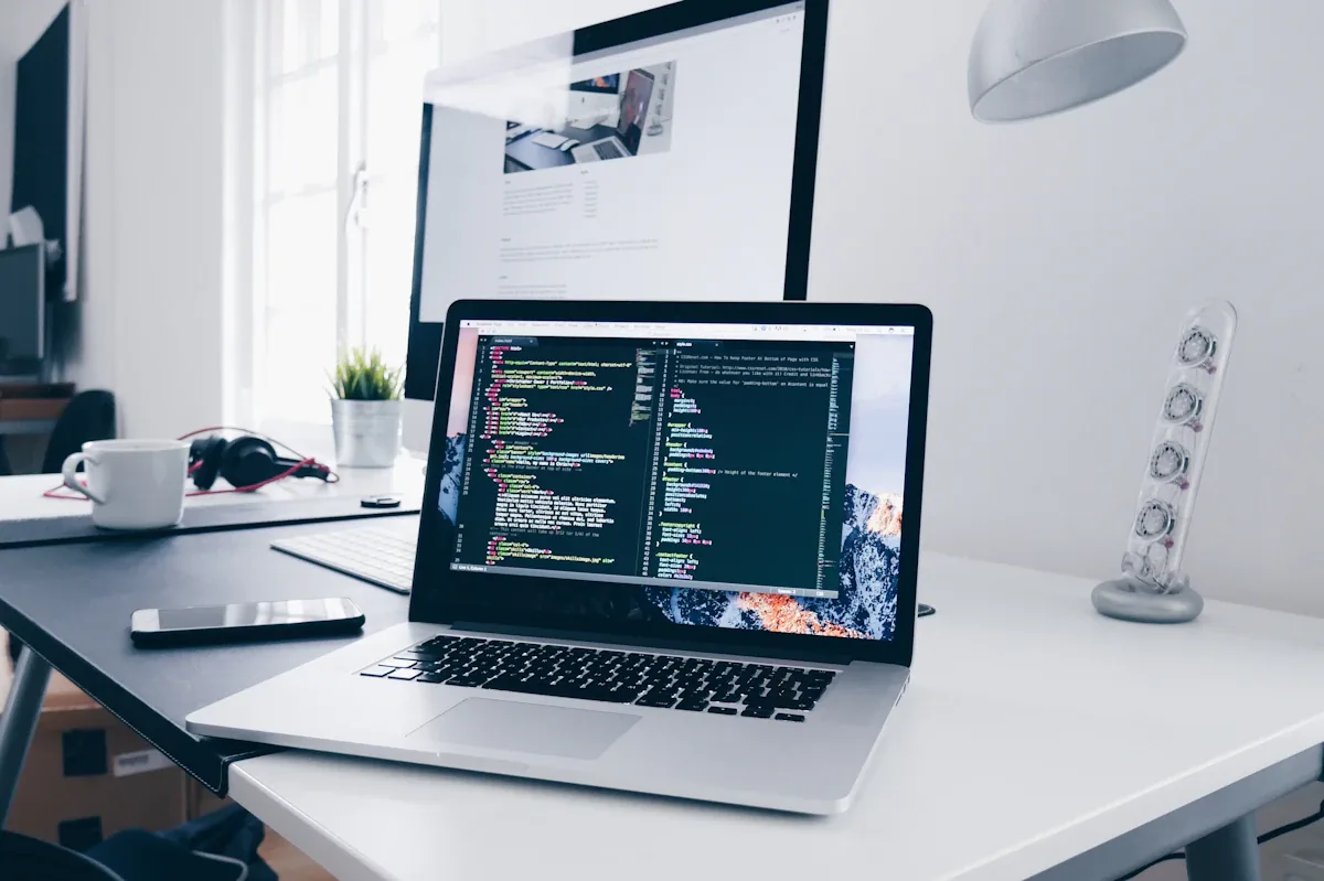 Laptop and monitor set up in a home office for remote work
