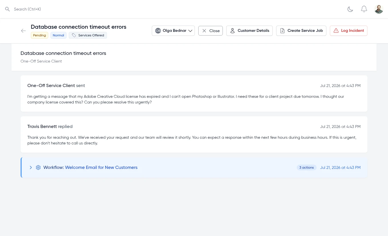 Support ticket thread with automated workflow actions and a Create Service Job button